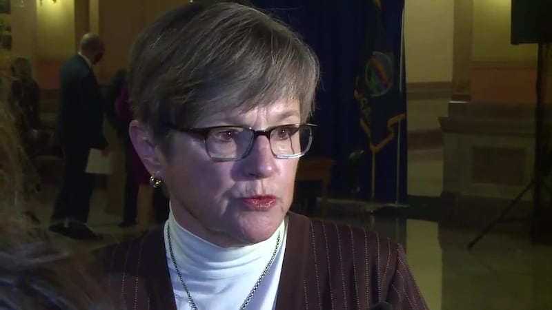 Gov. Laura Kelly, D-Kansas, speaks with reporters at the Statehouse, May 13, 2021.
