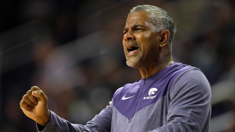 Kansas State head coach Jerome Tang talks to his players during the second half of an NCAA...
