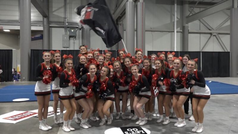Rossville High School's cheer team gets ready for their competition at the Stormont Vail...