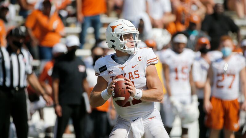 Texas quarterback Sam Ehlinger (11) prepares to throw a pass against Oklahoma during the...