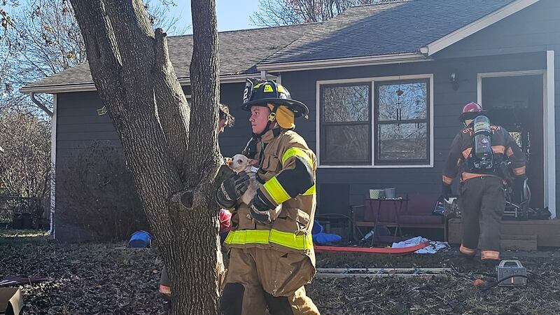 Crews evacuate pets from a Eudora home following a weekend fire on Nov. 18, 2023.