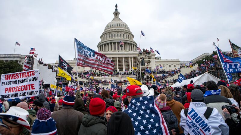 FILE - Insurrectionists loyal to President Donald Trump storm the U.S. Capitol in Washington...