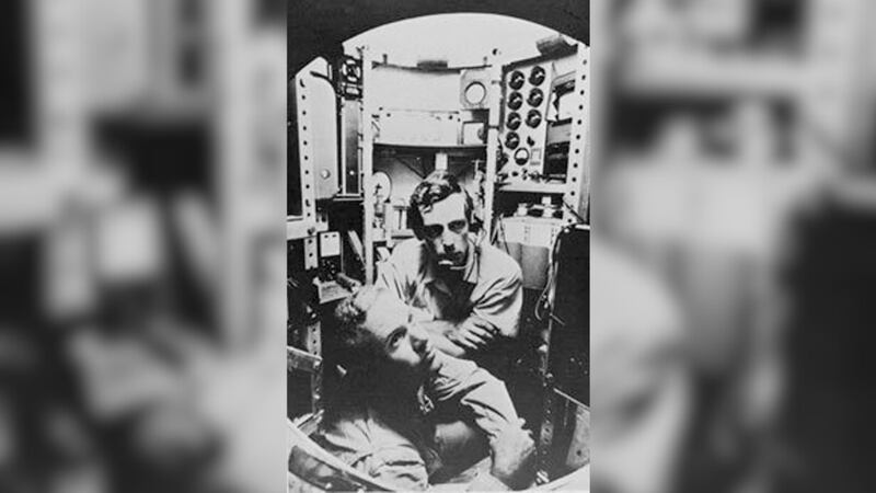 In this photo provided by the U.S. Navy, Navy Lt. Don Walsh and explorer Jacques Piccard...