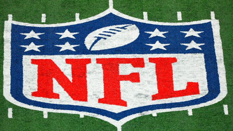 FILE - The NFL logo is seen at a stadium on Nov. 2, 2020, in East Rutherford, N.J. Hundreds of...