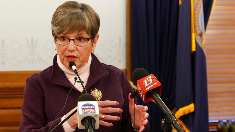 Kansas Gov. Laura Kelly answers questions about the COVID-19 pandemic during a news...