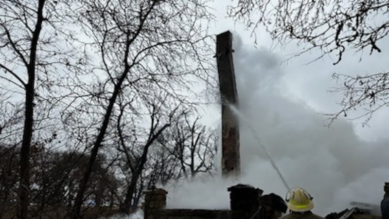 Crews extinguish a fire at an abandoned structure on Nov. 20, 2023.