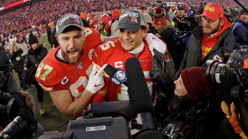 File - Kansas City Chiefs' Travis Kelce, left, celebrates with Patrick Mahomes after the NFL...