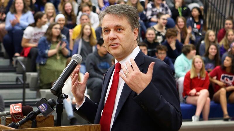 Gov. Jeff Colyer speaks to those gathered at Topeka's Seaman High School Tuesday morning,...