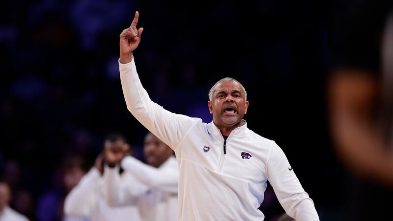 Kansas State head coach Jerome Tang signals in the second half of a Sweet 16 college...